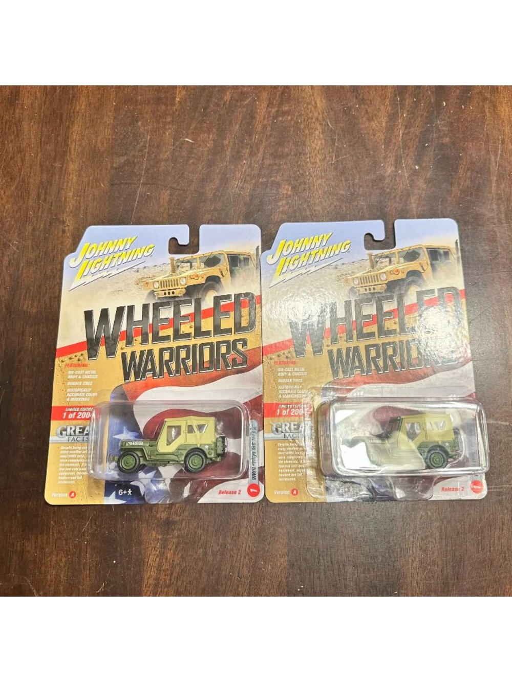 Two Johnny Lightning Wheeled Warriors Die-Cast WWII Willys MB Jeep 1/64 Scale